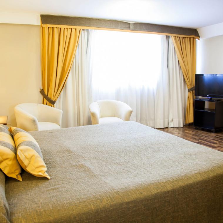 Quarto Duplo
